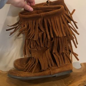 Tall fringe boots